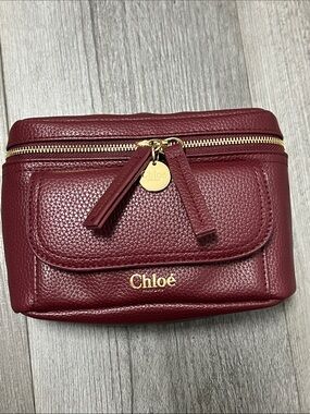 Chloe Parfums burgundy faux leather cosmetic pouch/ like new